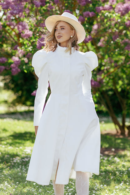 Fitted and flared coat with balloon-styled sleeves in white
