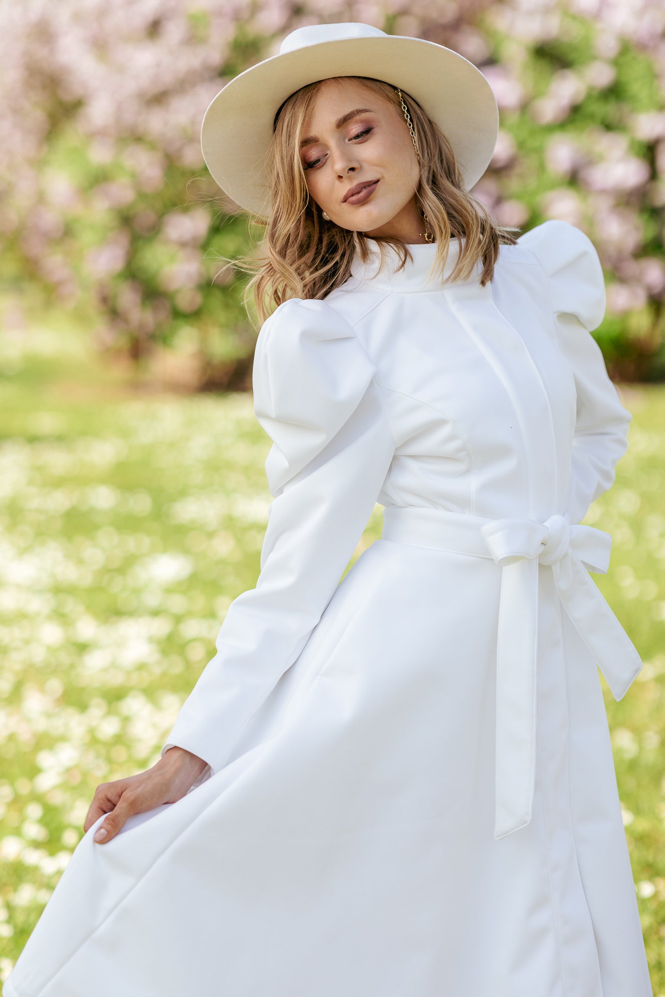 Vintage-inspired white coat with solid white belt