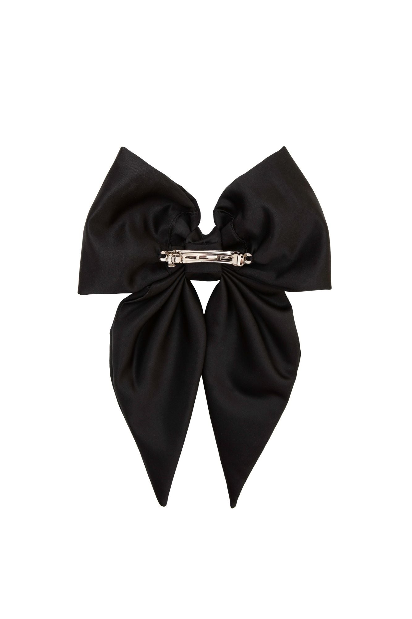 Black bow hair clip on a white background