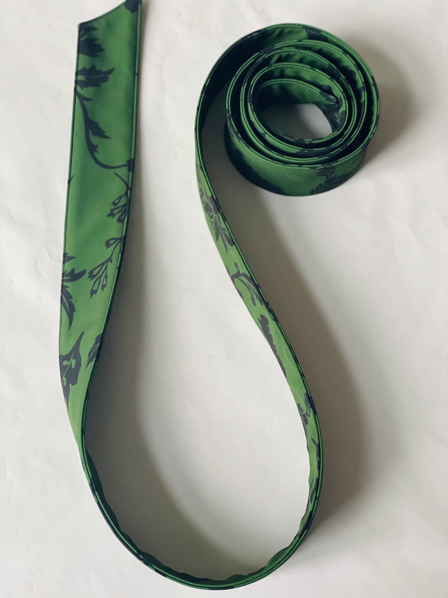 Green fabric belt with black floral print | Forest Flower