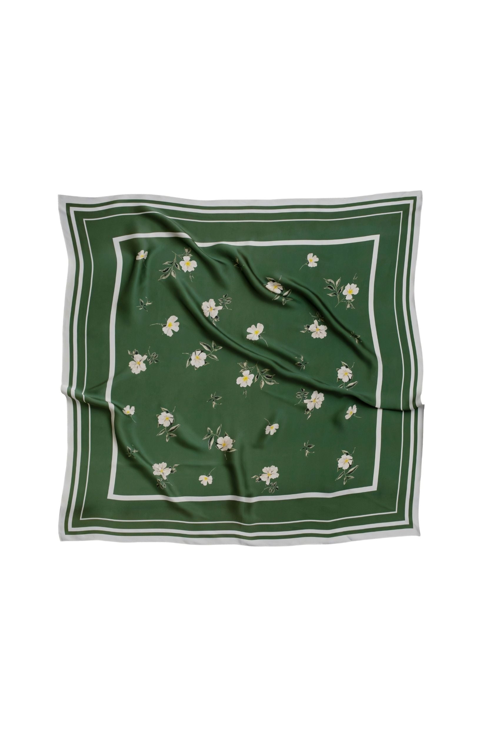Green square scarf with floral pattern on a white background