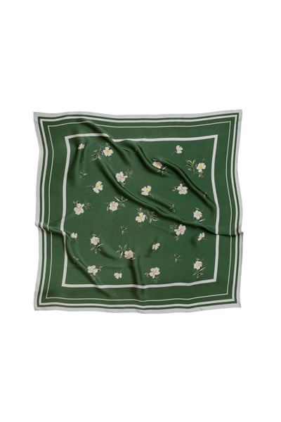 Green square scarf with floral pattern on a white background