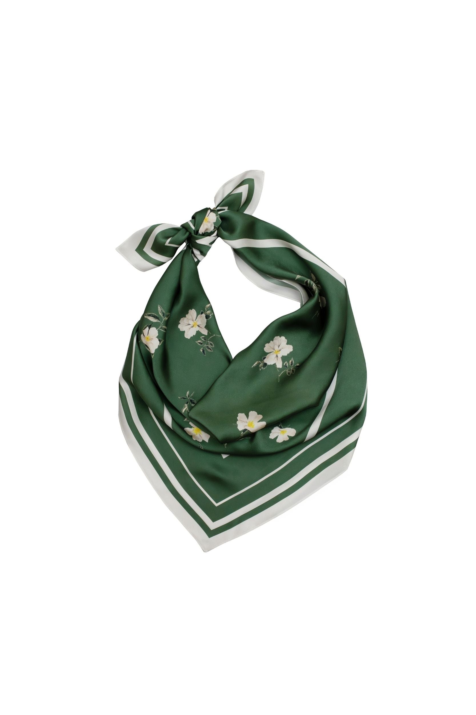 Green scarf with floral pattern tied on a white background