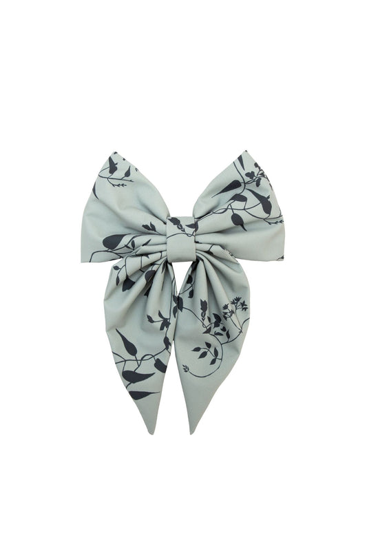 Hair bow with floral pattern on a white background