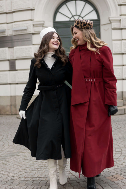 Elegant Obsidian Frost and Winter Maroon coats in city setting, belted and insulated for cold weather protection.