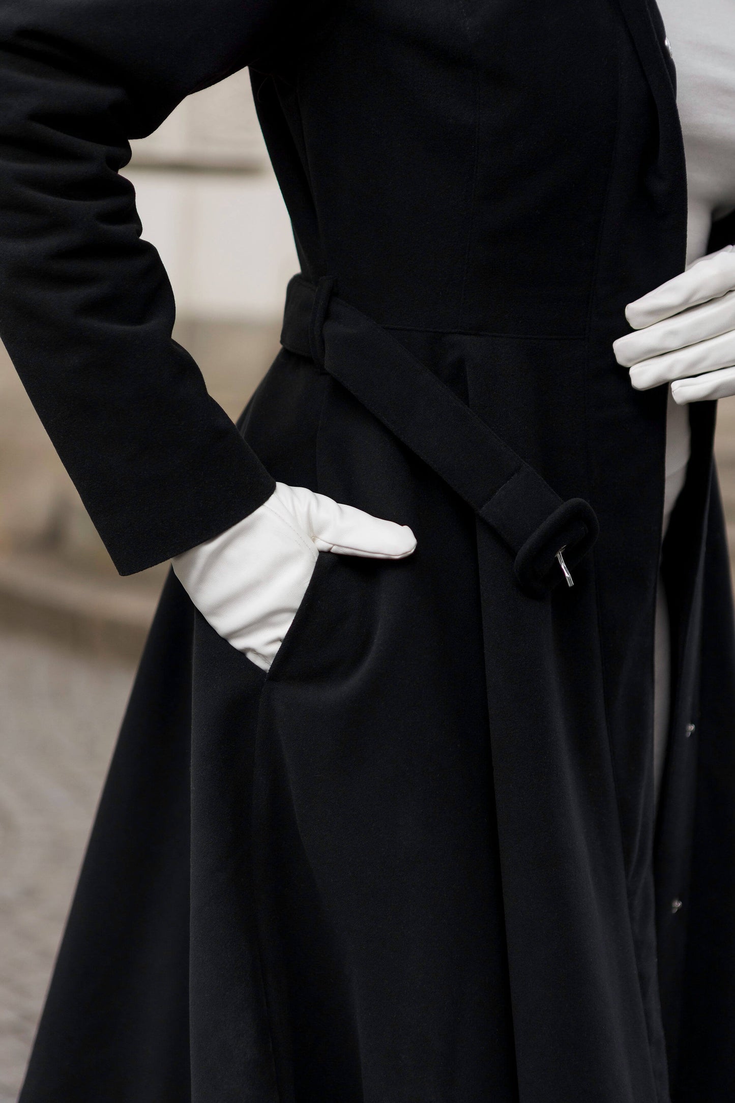 Elegant winter outerwear for women — Obsidian Frost coat with waterproof membrane fabric.