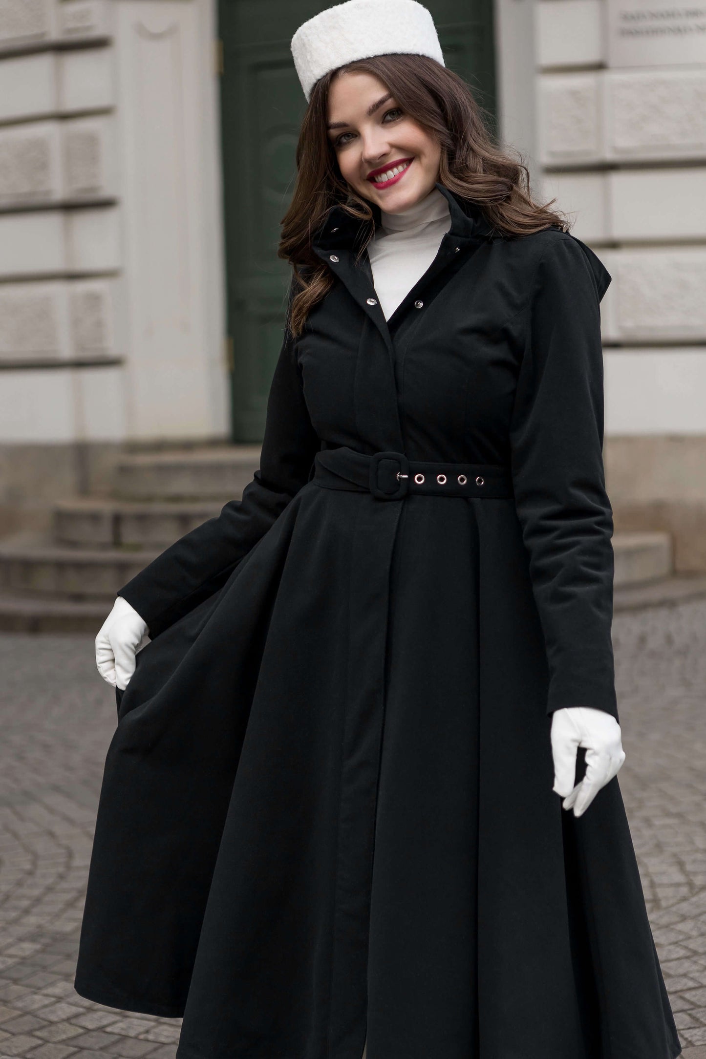 Stylish A-line winter coat for women, belted and lined with soft Italian satin for winter elegance.