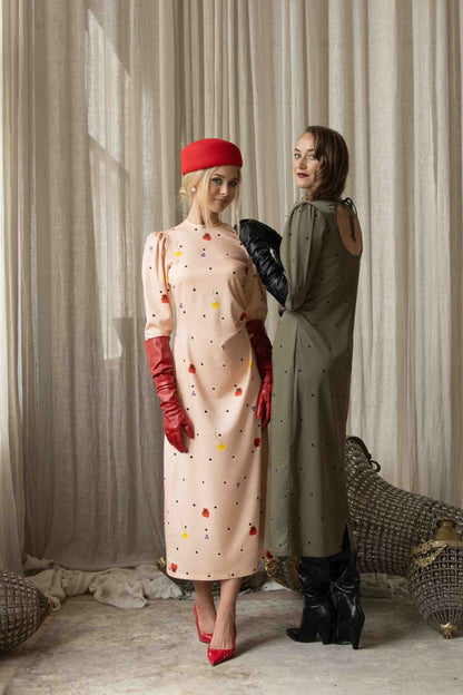 Playful yet elegant pink floral polka dot midi dress designed for garden parties, brunch, or date nights with dotted charm midi dress. 