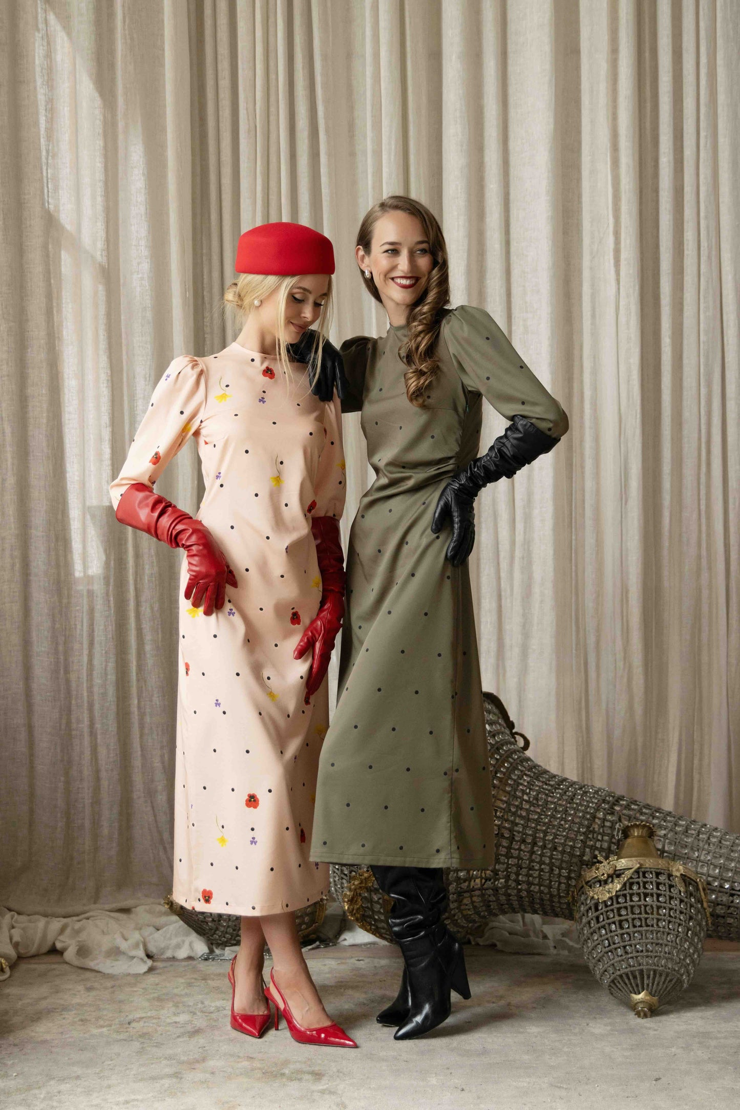 Tencel satin midi dresses with high neckline, gathered shoulder sleeves, back cutout detail, and romantic silhouette.