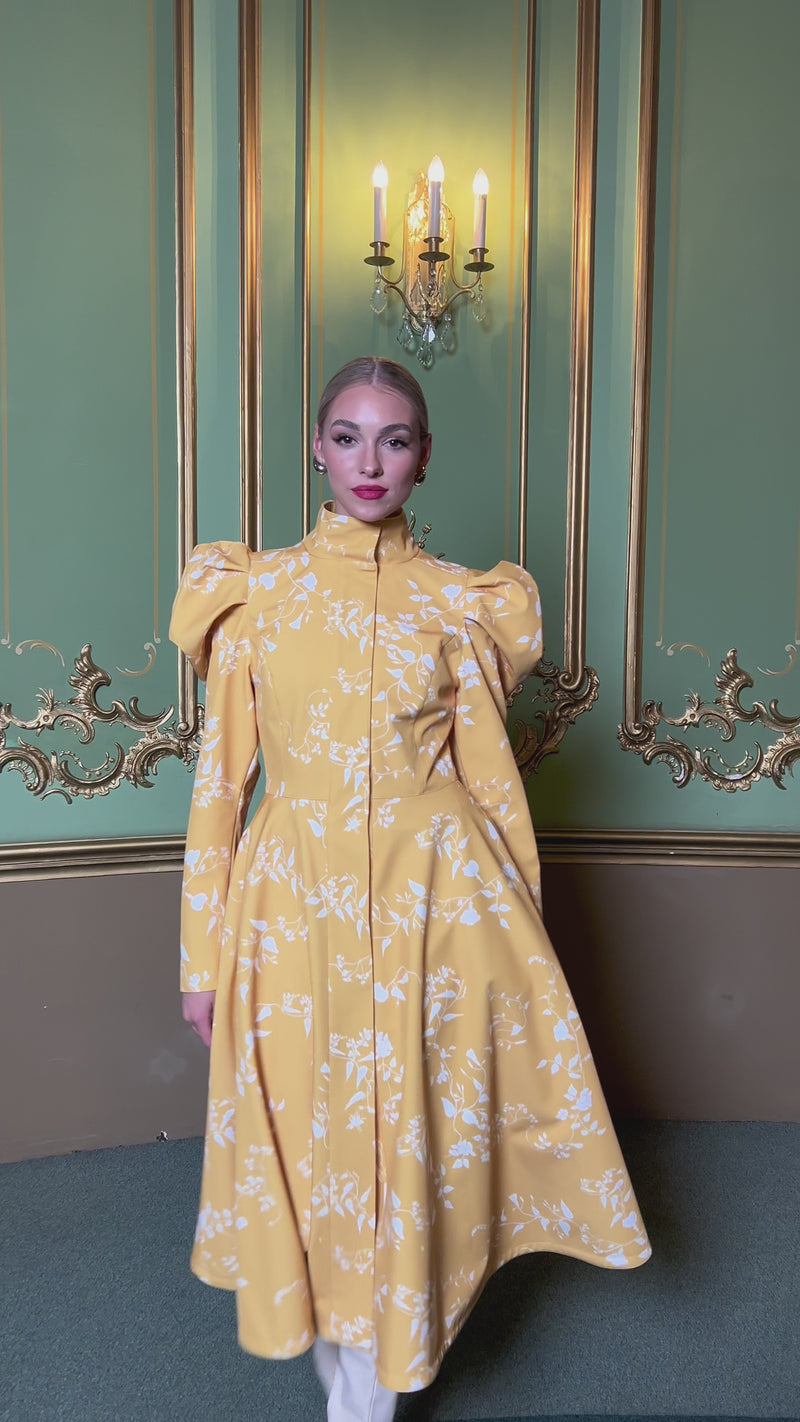 flower and leaf print on a trench coat