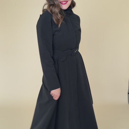 Elegant black winter coat for women – Obsidian Frost video highlighting warmth, design details, and luxury feel.