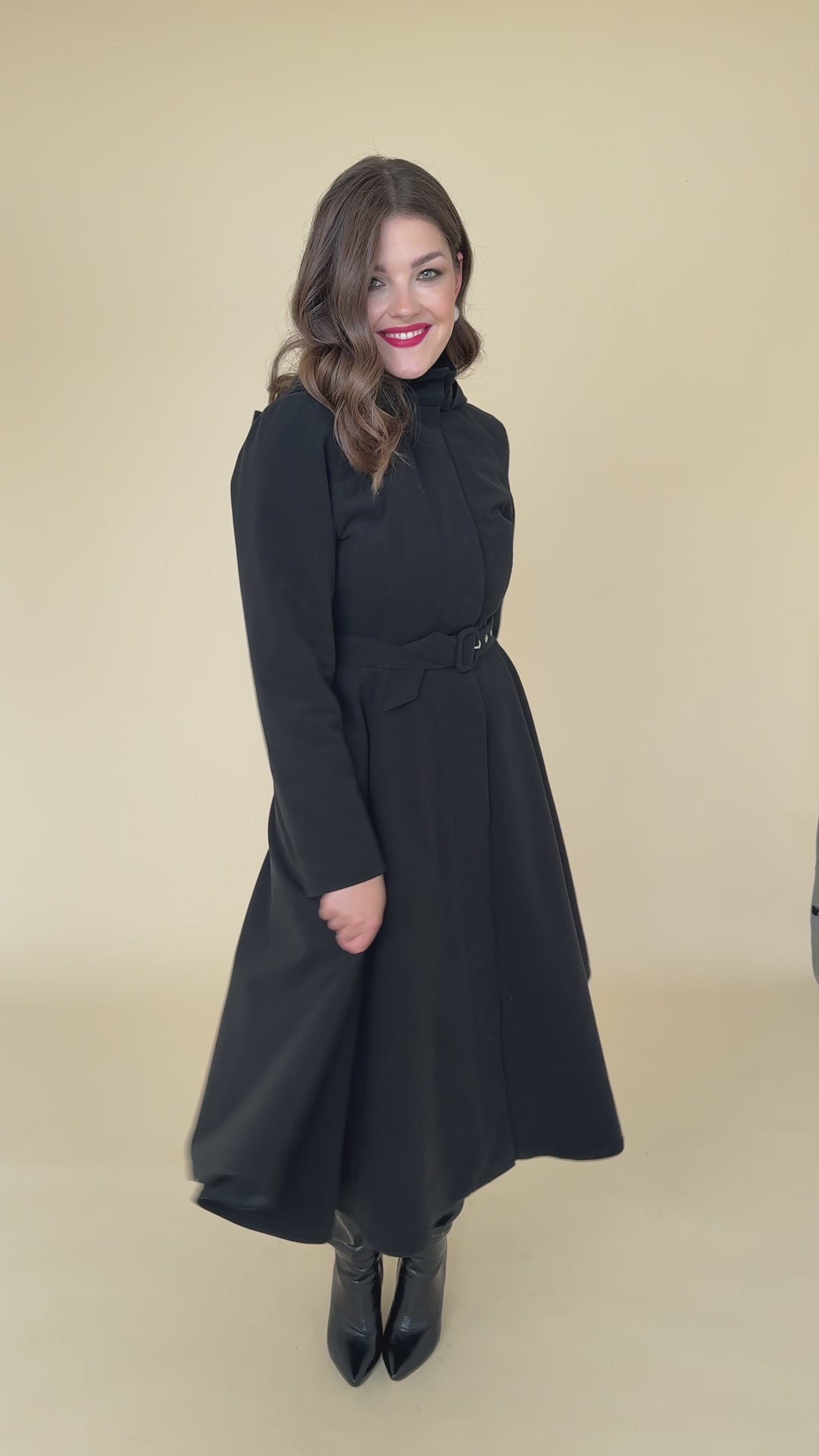 Elegant black winter coat for women – Obsidian Frost video highlighting warmth, design details, and luxury feel.