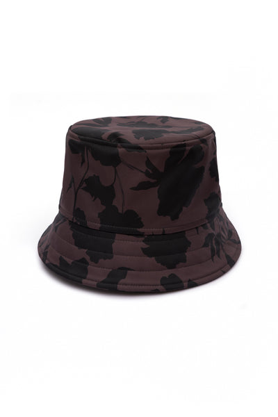 Brown floral softshell bucket hat for women featuring a black floral print, water-resistant fabric, and breathable cotton lining.