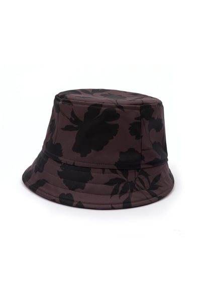 Women's brown floral bucket hat in water-resistant softshell fabric with an elegant black floral print and soft cotton lining.