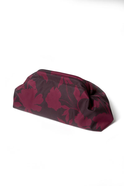 Burgundy floral clutch bag showcasing the rich wine-toned floral print, vintage-inspired frame closure, and beautifully structured design.