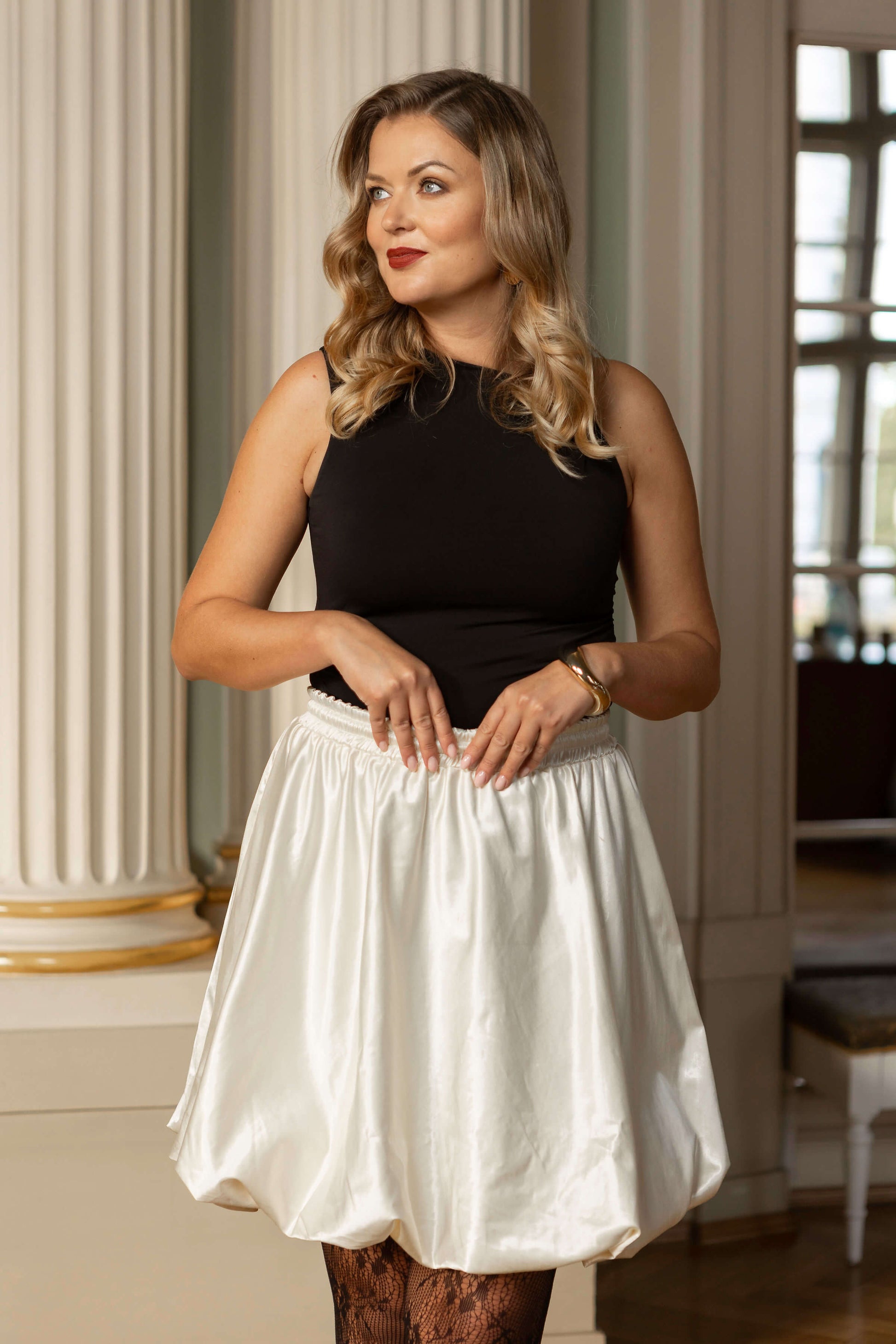 Mini-length off-white balloon skirt for women with hidden pockets, lined with Italian satin, ideal for layering under dresses for extra volume.