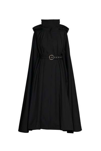 A black sleeveless high-neck cape coat by RainSisters, a matching waist belt, and a decorative round metal buckle, shown against a plain white background.