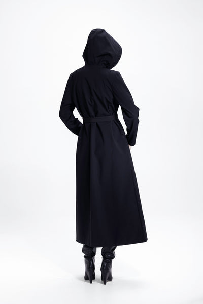 Back view of black women's double-breasted coat with flared trapeze shape