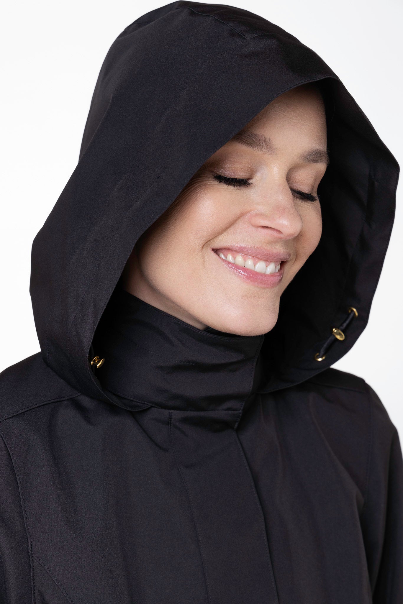 Close-up of detachable hood on Black Sway black water-resistant women's coat