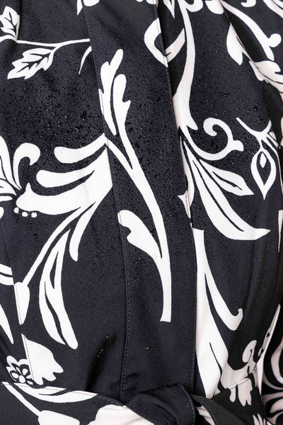 Black and white flower print detail on women's designer trench coat by RainSisters
