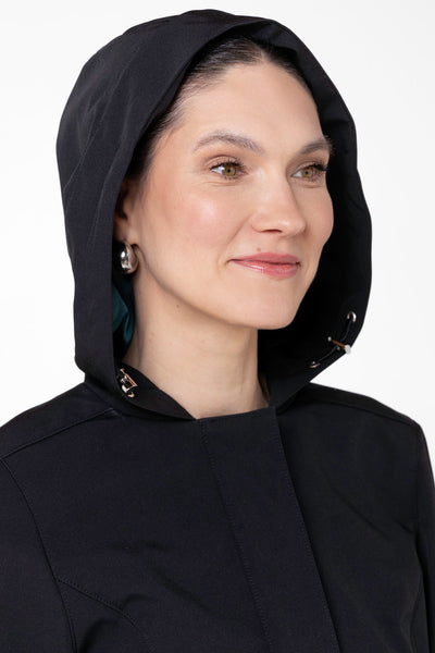 Close-up of hood detail on Deep Emerald black women's designer coat