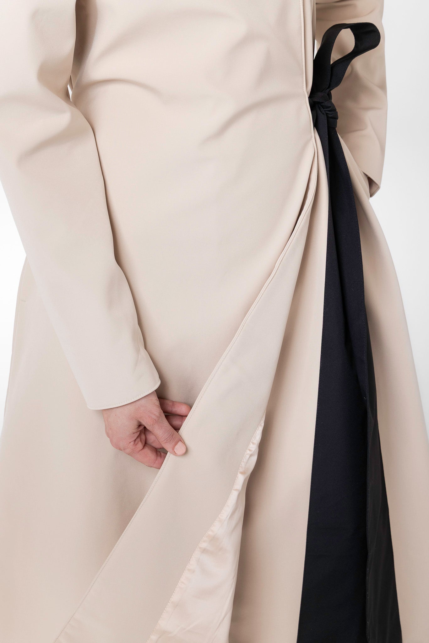 Soft beige Italian satin lining inside Desirable Bow women's waterproof coat
