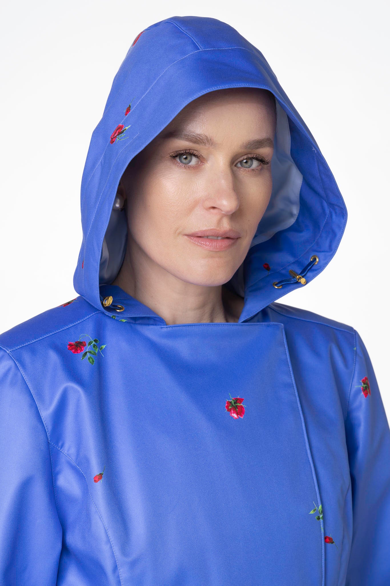 Close-up of hood detail on Forget-Me-Not blue waterproof women's floral trench coat