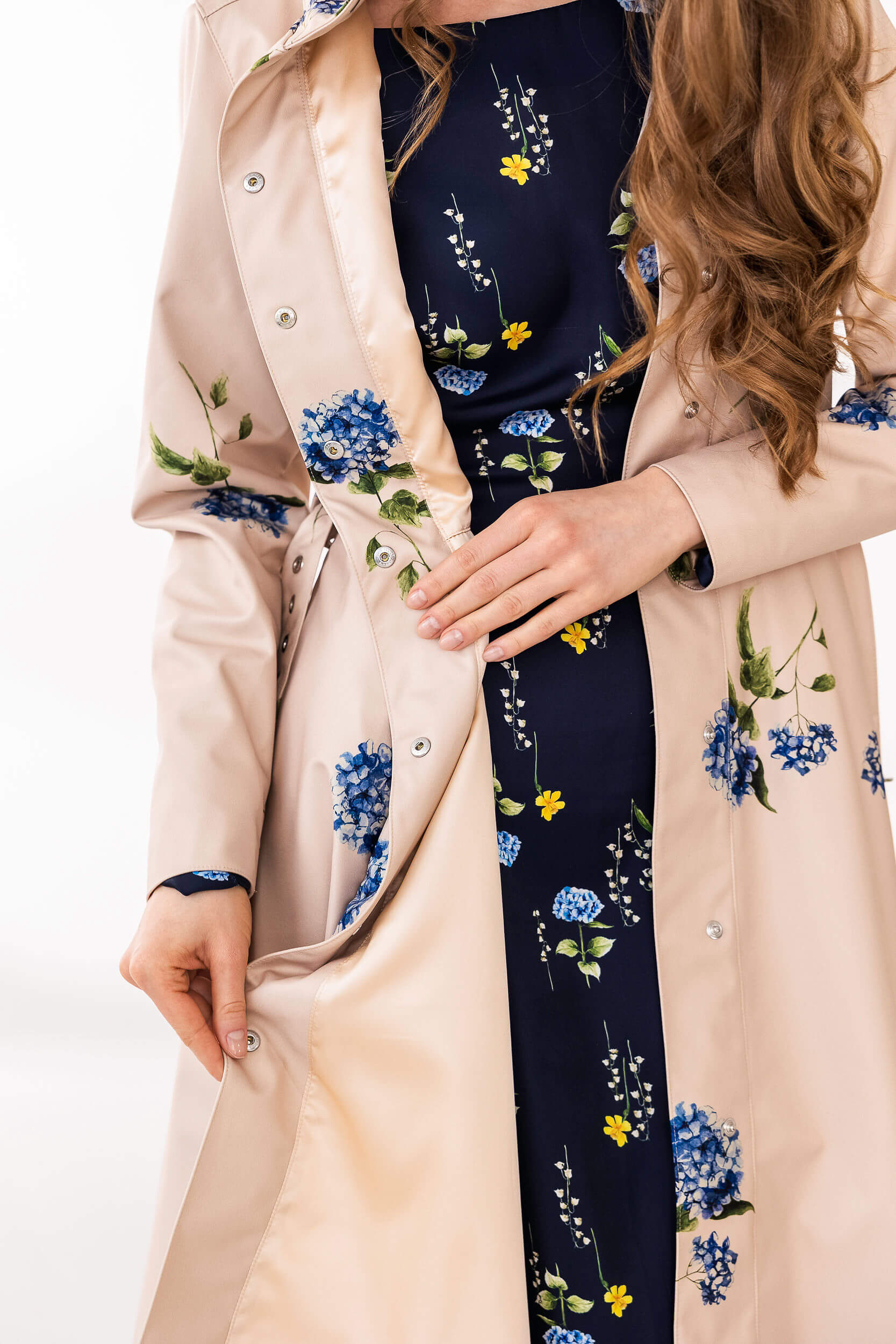 Stylish women’s waterproof coat with soft blue floral print