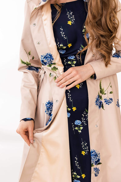 Stylish women’s waterproof coat with soft blue floral print