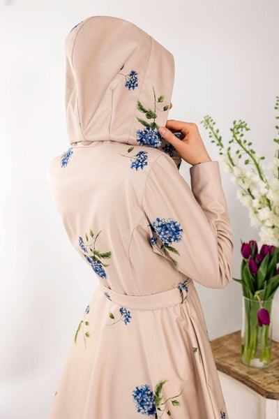 Belted A-line coat with detachable hood for colder weather