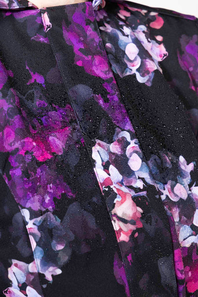 Purple and pink flower print detail on black women's designer trench coat by RainSisters