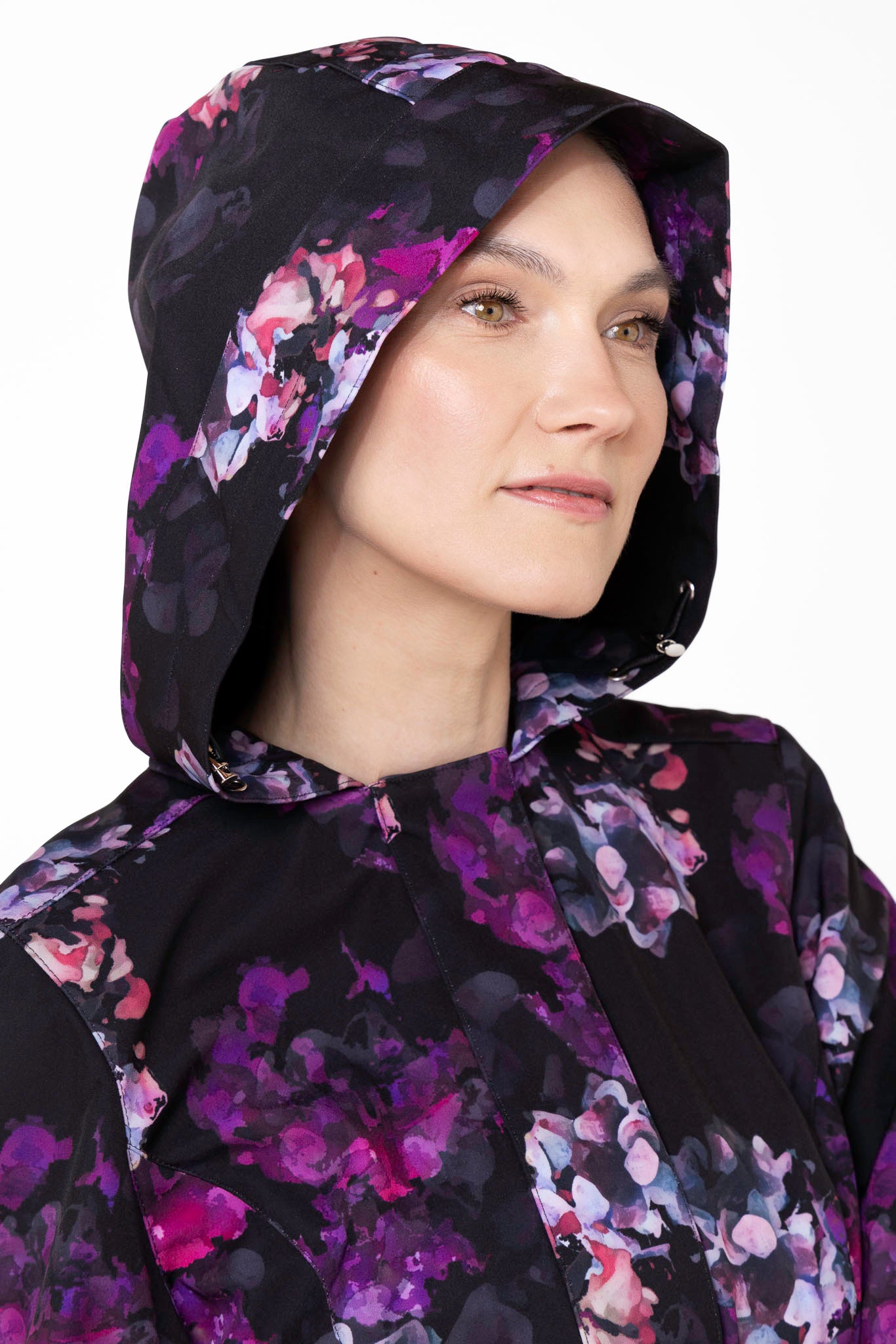 Close-up of hood detail on Hortense black floral waterproof women's coat