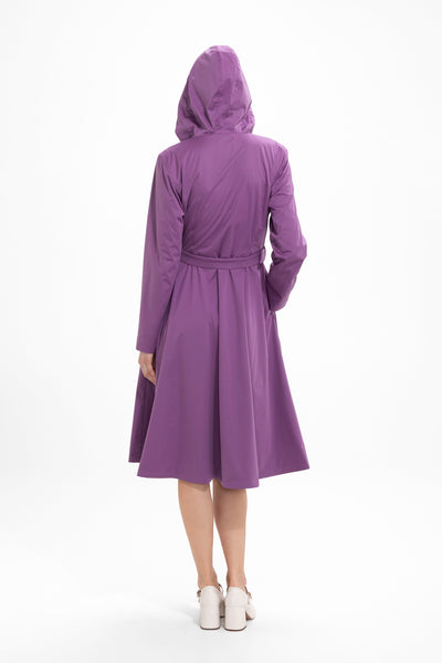 Back view of purple waterproof women's coat with tailored silhouette