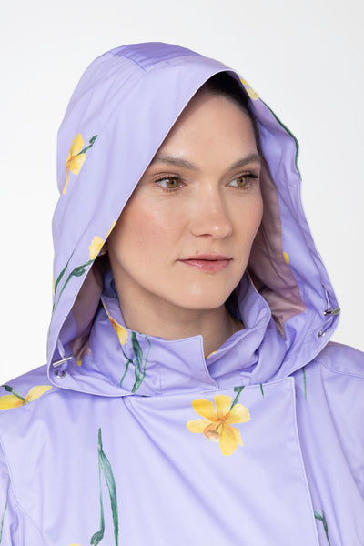 Close-up of detachable hood detail on Lilac Joy light purple women's jacket