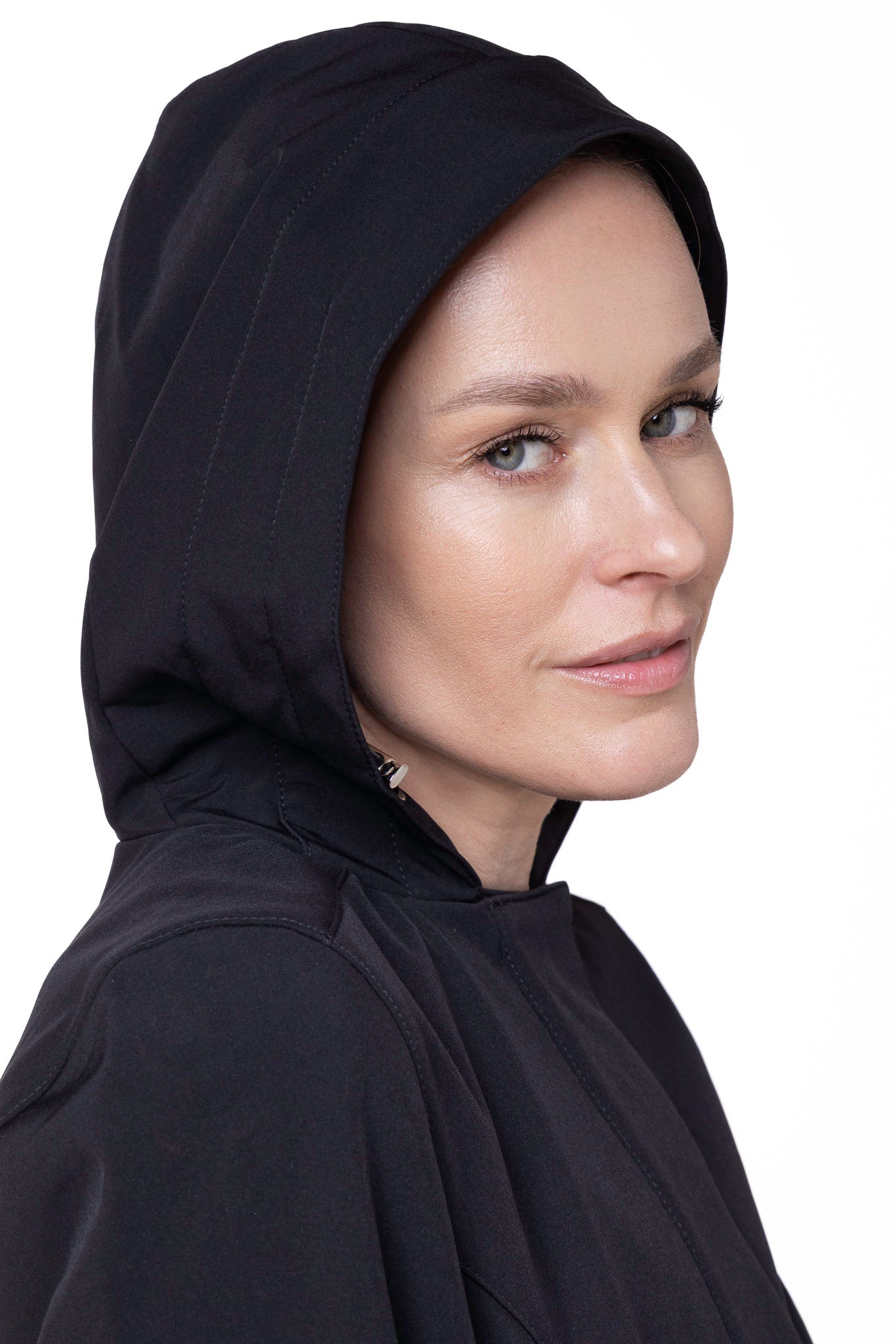 Close-up of hood detail on Midnight Black women's tailored fashion coat