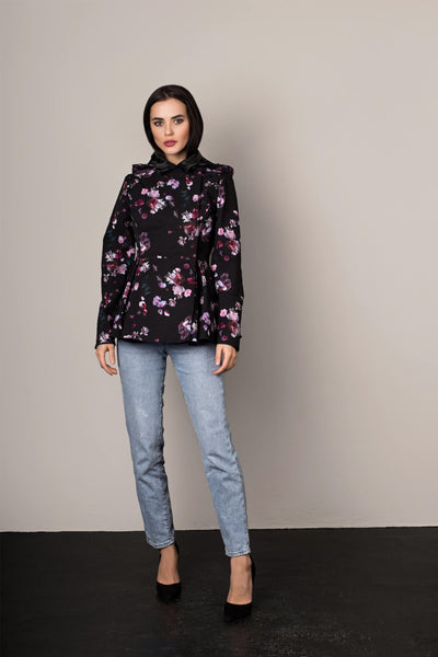 Flared peplum hem detail on fitted black floral women's jacket
