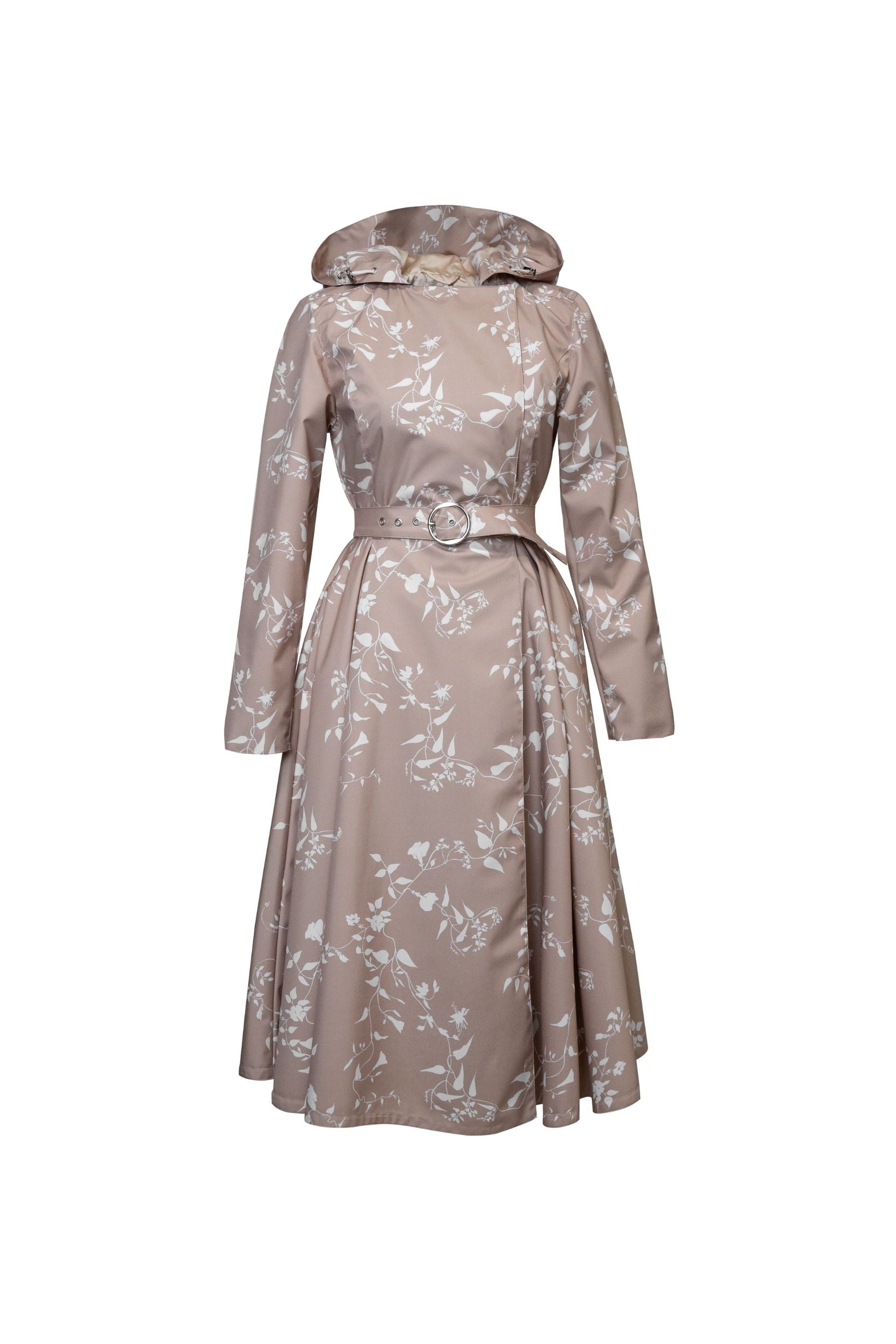 Floral-patterned beige designer coat on a white background