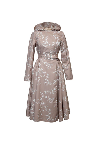 Floral-patterned beige designer coat on a white background