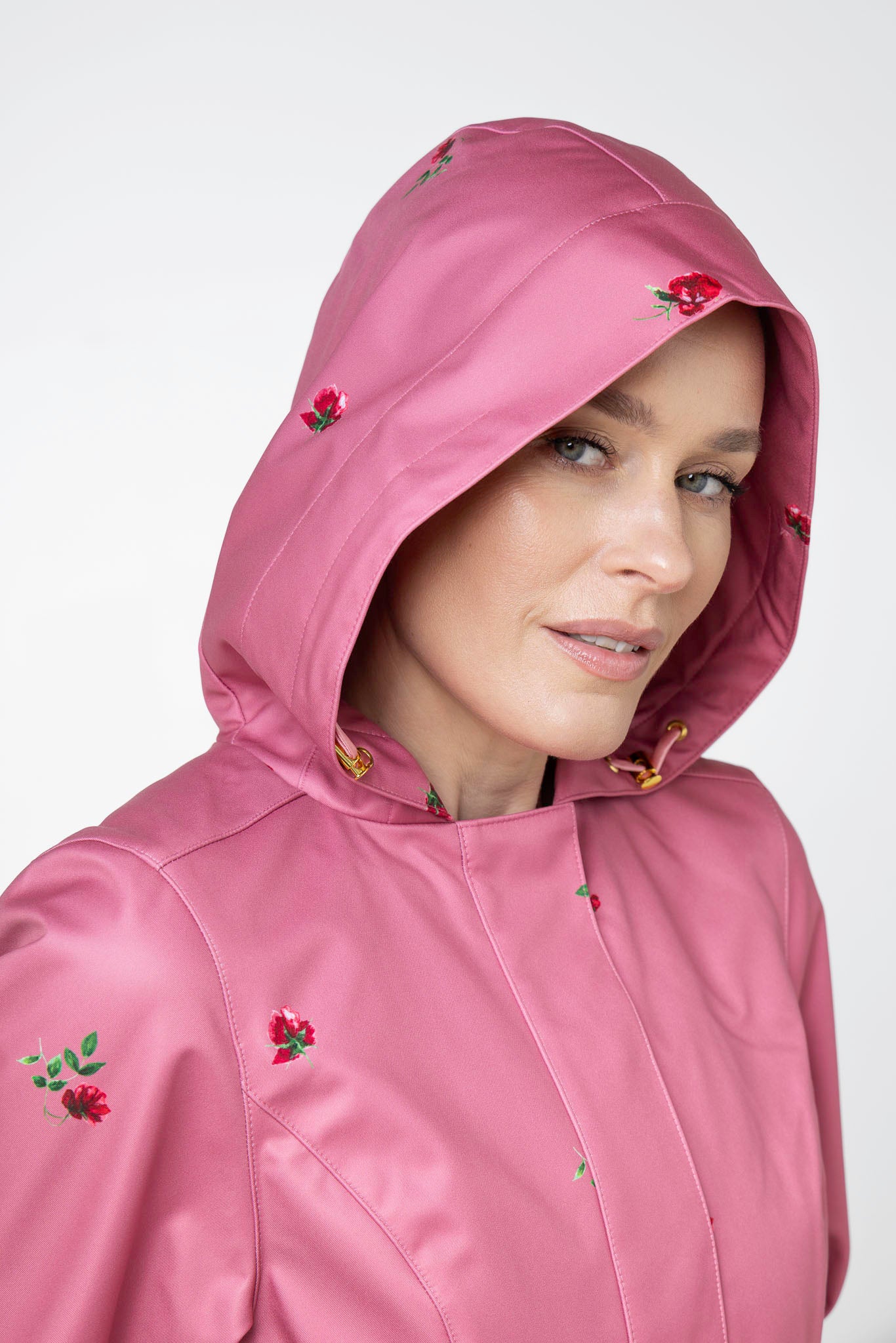 Close-up of hood detail on Raspberry Sorbet pink women's water-resistant floral coat