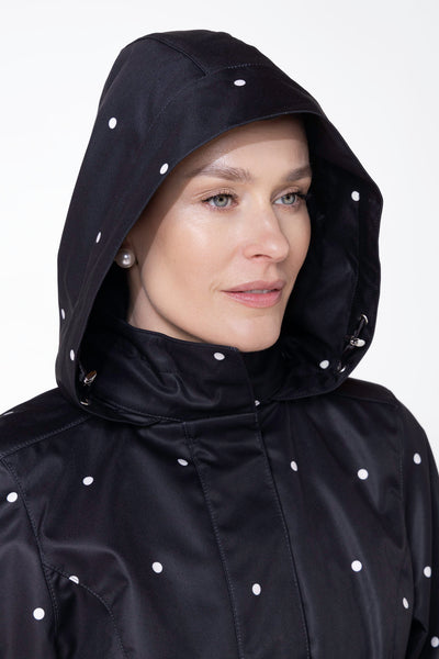 Close-up of hood detail on Timeless Polka Dots black water-resistant women's coat
