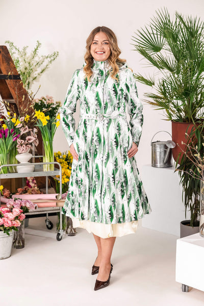 Green floral A-line coat with pleated skirt
