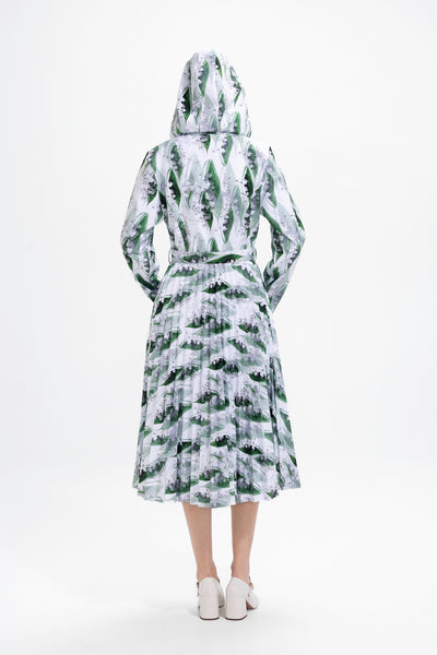 Back view of white-green waterproof women's coat with fitted bodice and flared skirt
