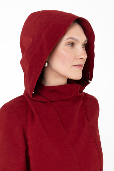 Close-up of hood detail on maroon double-breasted women's winter coat