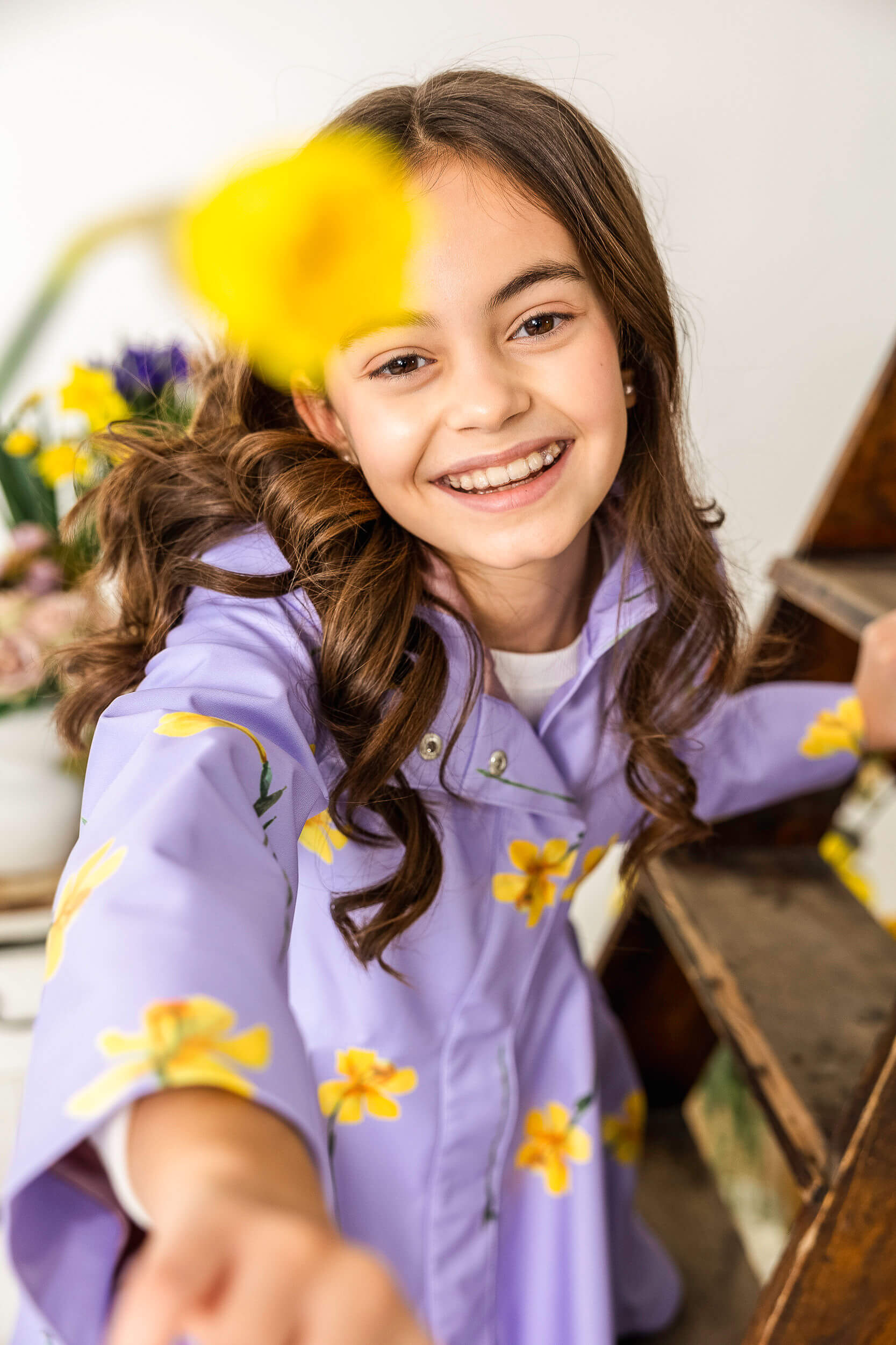 Lilac fit and flare girls coat with pink satin lining.