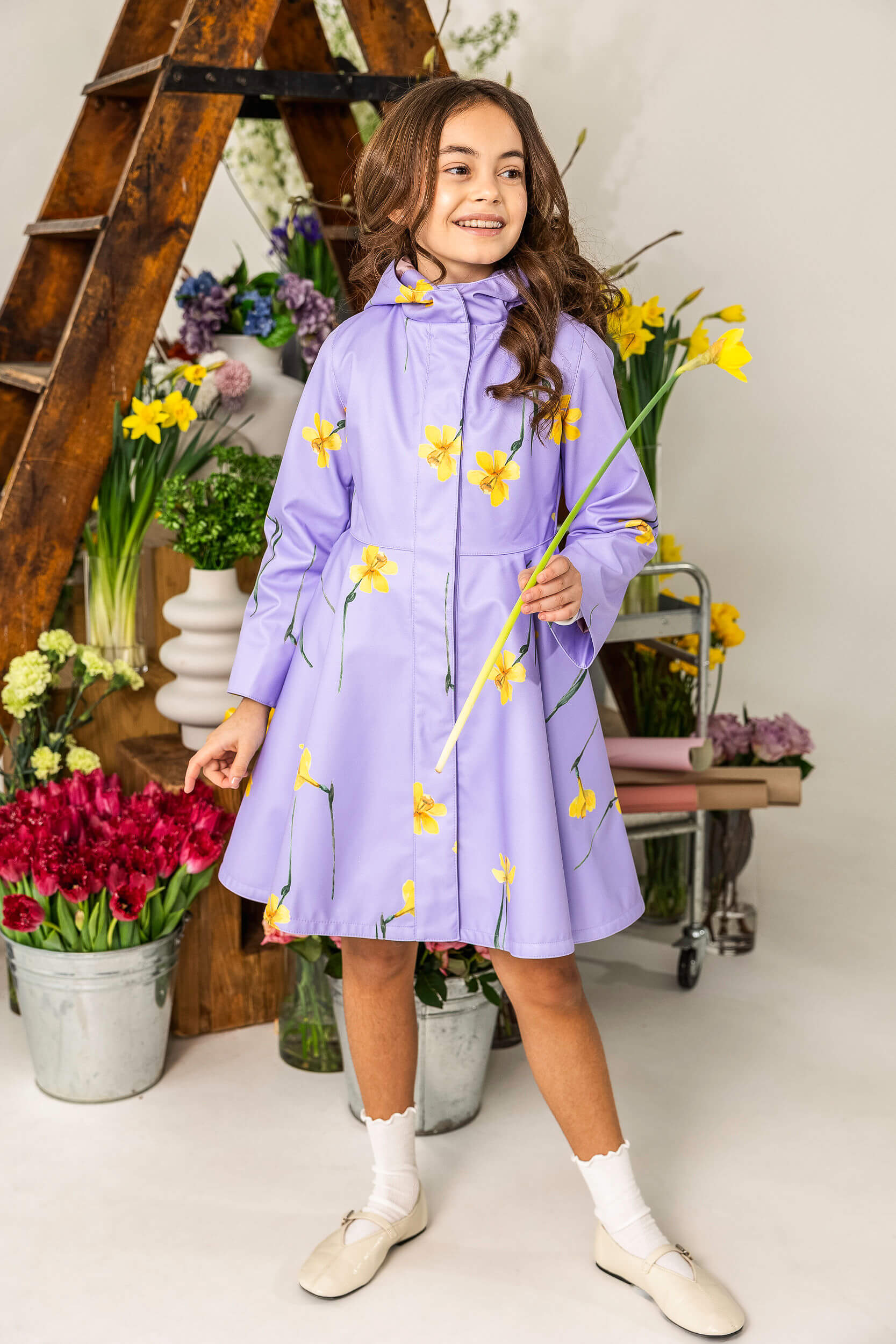 Girls lilac waterproof softshell coat with yellow floral print