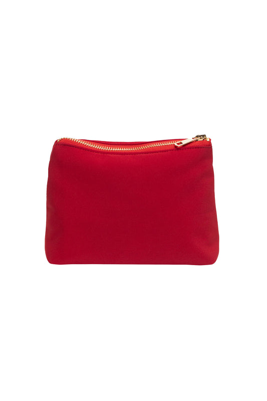Red pouch with a gold zipper on a white background