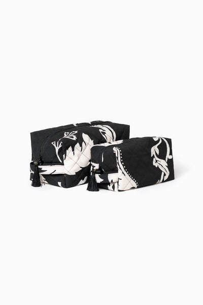 Black makeup bag set with white floral print for makeup, toiletries, and travel essentials