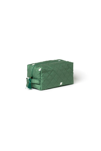 Large green floral toiletry bags with zip closures, mint lining, and decorative tassel details.