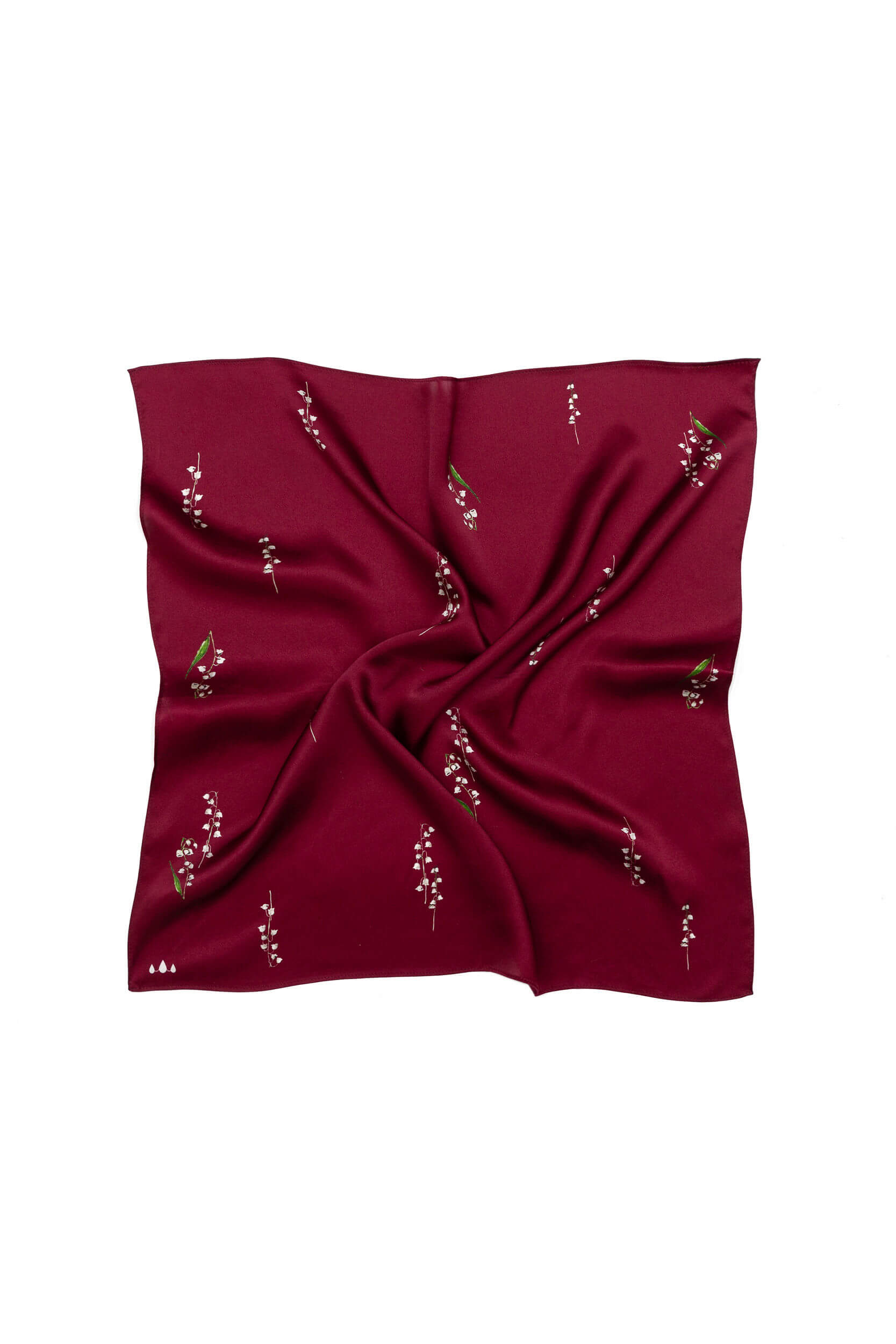 Burgundy fabric with floral print on a white background