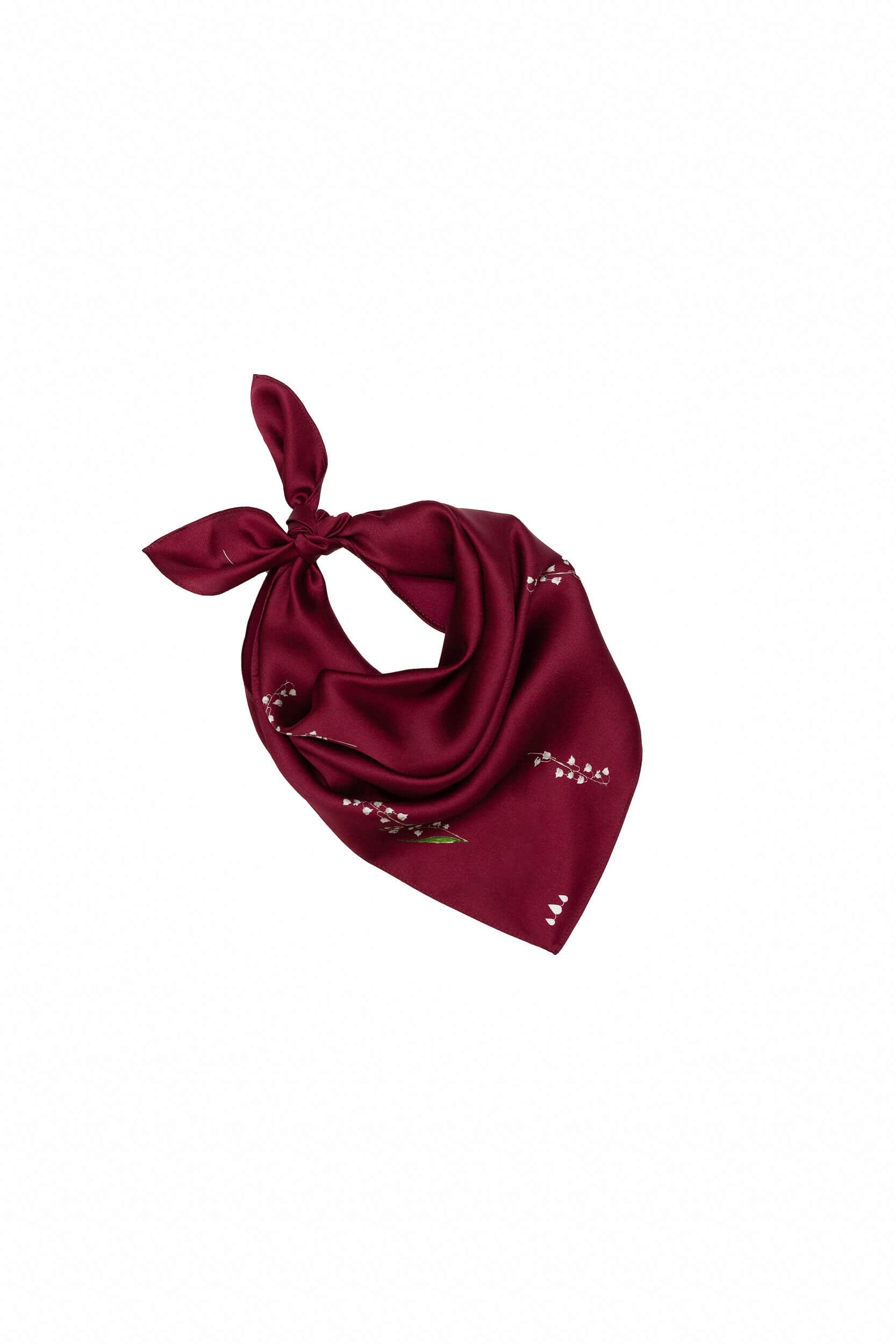Red scarf with floral print on a white background